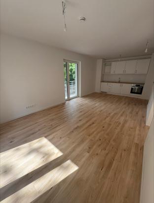 Wohnbereich mit Einbauküche Wohnbereich mit Einbauküche
